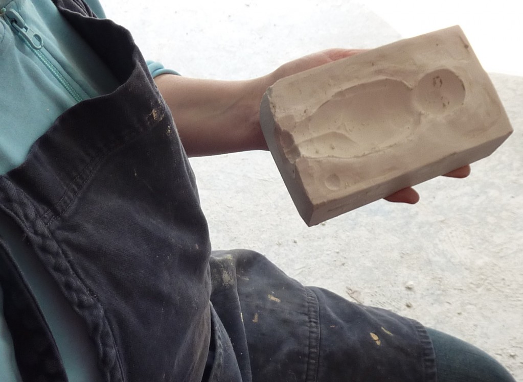 Baby image in plaster.