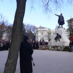 The monument is adorned wth floral tributes