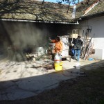 The ICS  Raku ritual, Jakab with oil, Klari with funnel, and black smoke...