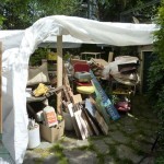Studio stuff The contents of my whole studio under wraps in the back yard. Truck loads went to the city dump.